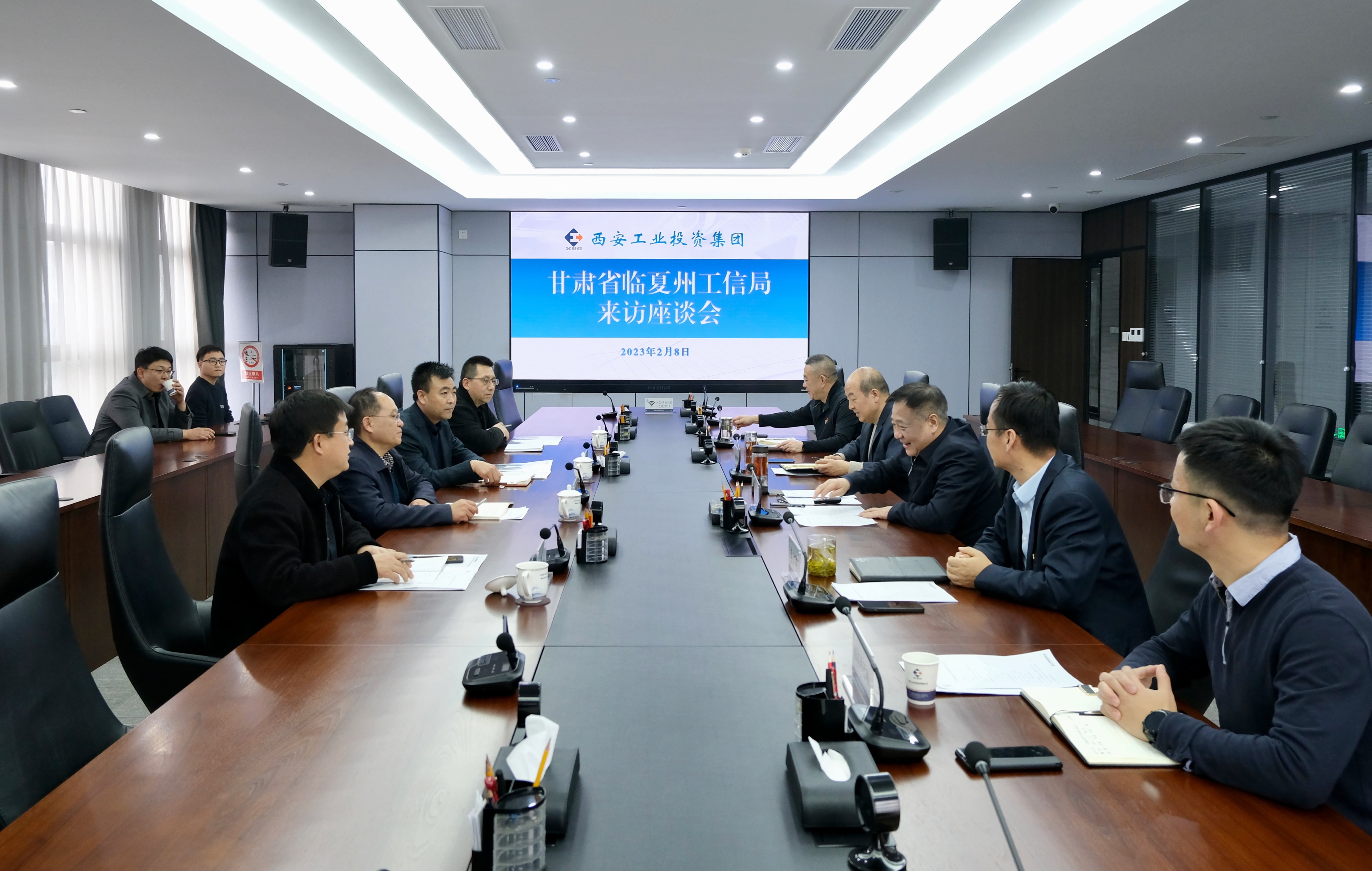 甘肃省临夏州工信局到九州ku酷游集团举行事情交流